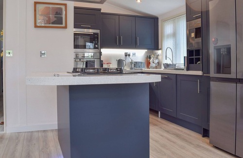 Tiddington Cottage | Overlooking the River Avon is this beautiful, peaceful and serene lodge.