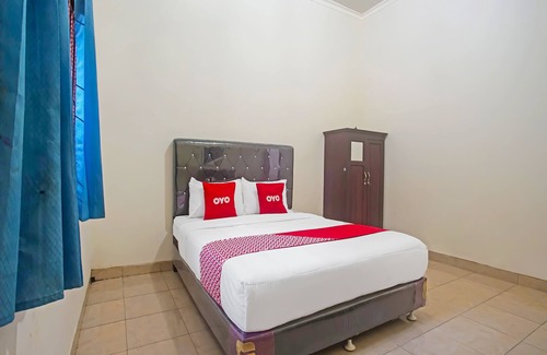 Metro Hotel | OYO 1804 Guest House Oema'h Opa