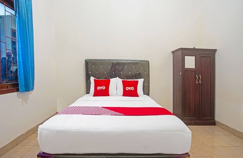 Metro Hotel | OYO 1804 Guest House Oema'h Opa