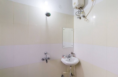 Sualkuchi Hotel | OYO 6996 near Beltola