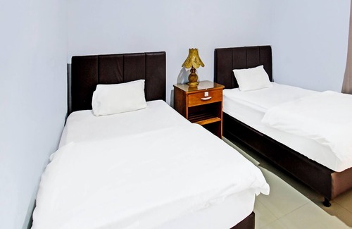 Labuhan Pandan Hotel | OYO 91965 Swan Homestay