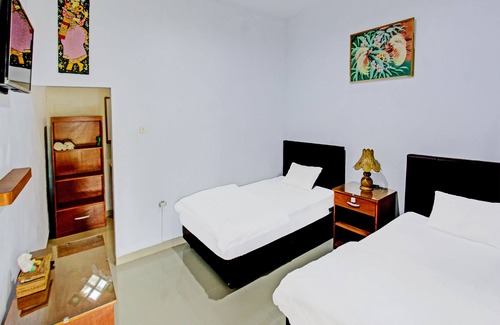 Labuhan Pandan Hotel | OYO 91965 Swan Homestay
