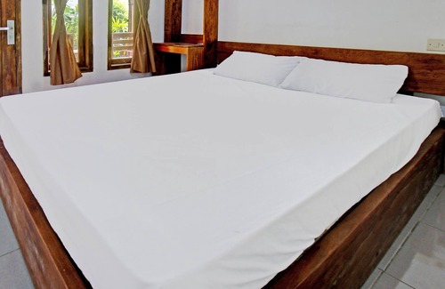 Muncan Hotel | OYO 92275 Tastura Homestay