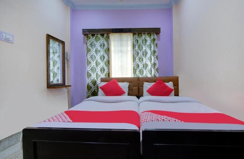 Neora Hotel | OYO Hotel Dhara