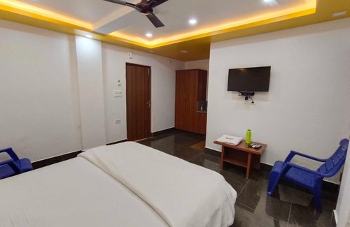 Hoskote Hotel | OYO Hotel Vasudha Inn