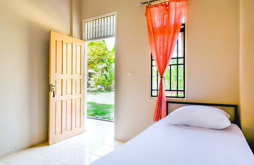 Mandau Hotel | OYO Life 2745 Nabeza House