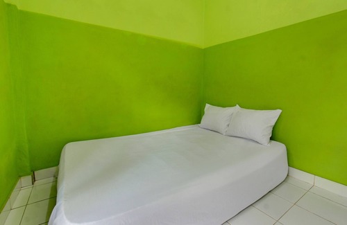 Muncan Hotel | OYO Life 92829 Kos Insan Madani