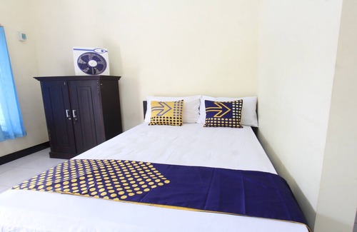 Muncan Hotel | OYO Life 93155 Wisma Sarah