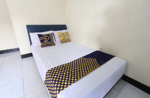Muncan Hotel | OYO Life 93157 Kos Kaloka