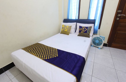 Muncan Hotel | OYO Life 93157 Kos Kaloka