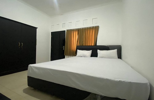 Muncan Hotel | OYO Life 93255 Kosan Teratai Jaya