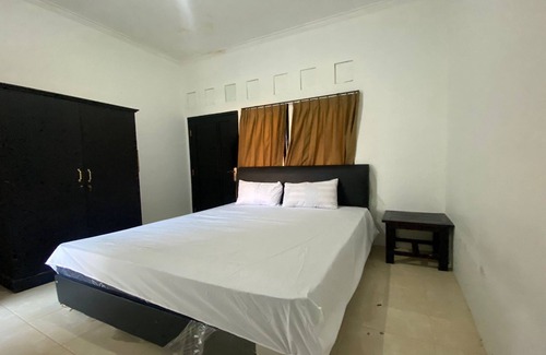 Muncan Hotel | OYO Life 93255 Kosan Teratai Jaya