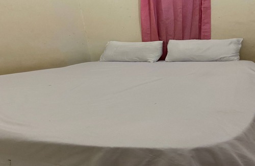 Kecamatan Janapria Hotel | OYO Life 93259 Kos Kurnia