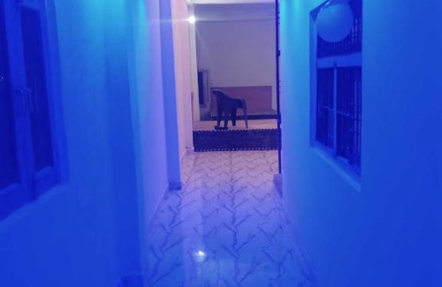 Auraiya Hotel | OYO The Bluemoon