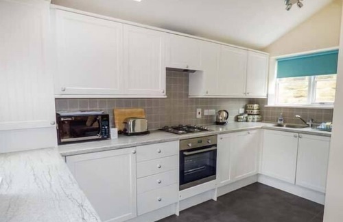 West Cliff Cottage | OYSTERCATCHER COTTAGE, pet friendly, with a garden in Whitby