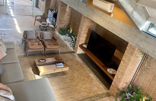 Barra do Una House | Pé na Areia de Cinema in Barra do Una designed by Arq Decio Tozzi