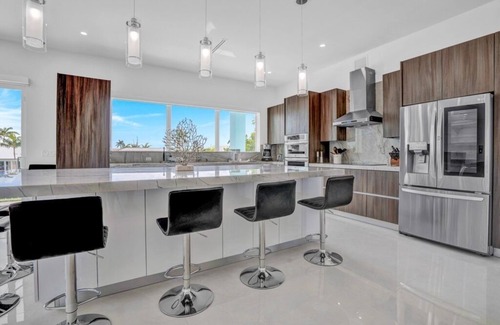 Coury House | P70 - Stunning 5 bed, 5 bath home with dockage and oversized private pool in.