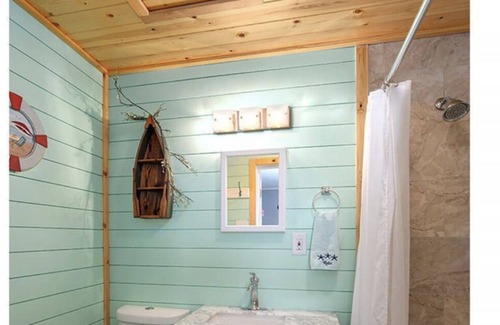 Port Pine Heights House | PADGETT PARADISE with Two Boat Slips with Filet Table. POOL