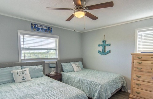 Port Pine Heights House | PADGETT PARADISE with Two Boat Slips with Filet Table. POOL