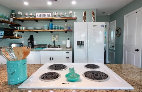 Jamaica Beach House | Palm Breeze Canal Home with Kayaks & Bicycles - Sleeps 6 STR25-000199