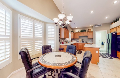 Oakwood House | Palm-lined home with pool access, grill, office & golf course views