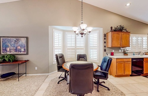 Oakwood House | Palm-lined home with pool access, grill, office & golf course views