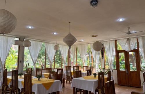 Dili Resort | Palm Malinamoc Hotel