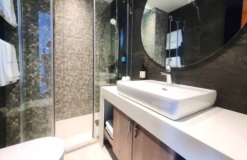Kfardebian House | Palm Paradise: Beachfront Exotic Room in Batroun