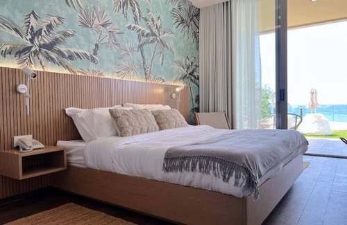 Kfardebian House | Palm Paradise: Beachfront Exotic Room in Batroun