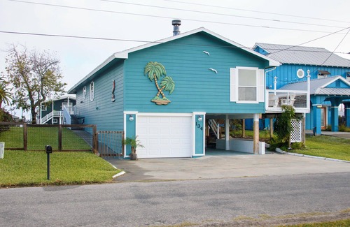 Palm Harbor Cottage | Palm Tiki