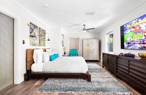 Poinsettia Heights Villa | Palms Retreat! Giant Heated Pool-HotTub-FirePit-5Min2Beach-Pets-EV Chgr