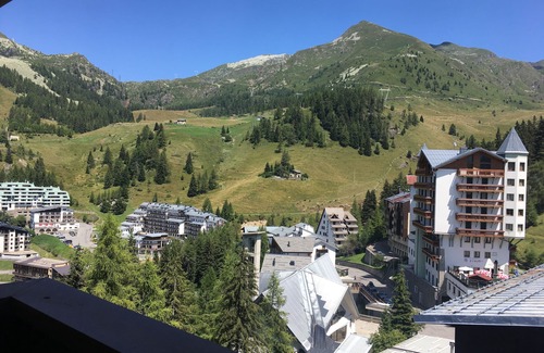 Foppolo Apartment | Panorama of Foppolo, the mountains and the slopes in the morning sun