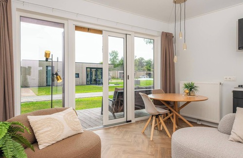 Municipality of Rijssen-Holten Resort | Panorama Wellness Lodge | jacuzzi, sauna and sunshower | 2 persons
