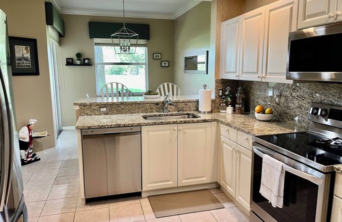 Naples House | Paradise Awaits! Country Club Living, Private Golf Course, beaches, 1st Floor!