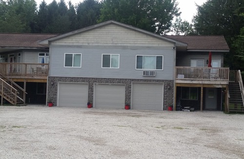 Norton Shores Apartment | Paradise Cove Harbor ~ 2 Bedroom/1 Bath Apartment WIFI, Fishing, and Firepit