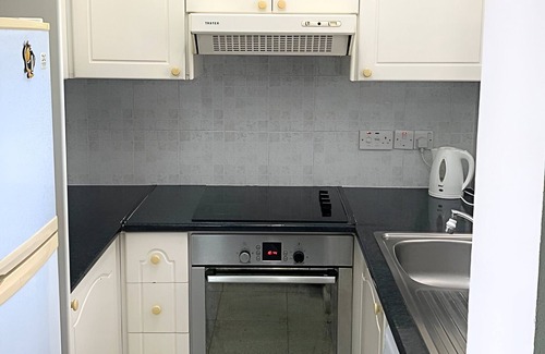 Universal Apartment | Paradise Gardens Cozy Oasis with AC, WIFI, and private pool