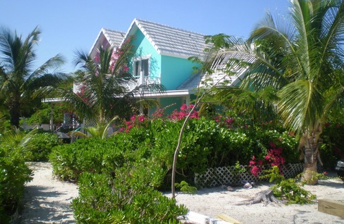 Freeport Cottage | Paradise on miles of white sandy beach and turquoise sea, private and secure.