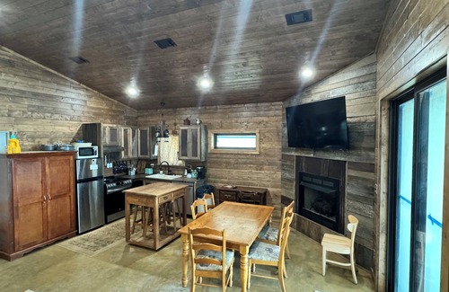 Centerville Cabin | Paradiso sunrise waterfront cabin sleeps 10 with large open room and AC, WiFi