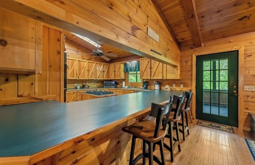 Epworth Cabin | Park Hollow - Explore the nearby river and soak in the hot tub!
