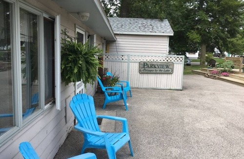 Ludington Apartment | Parkview Cottage #12- Half block from Lake Michigan Beach