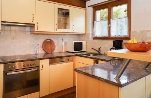 Klosters Dorf Apartment | Parnier by Interhome