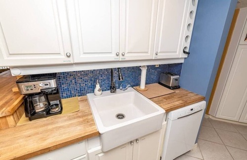 Crescent Beach Condo | Parrot Party - Ocean House 319
