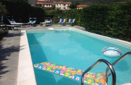 Strada Nazionale Sud House | Part of a villa with pool.
