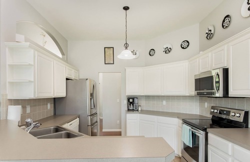 Wichita House | Patio Oasis & Basement Theater