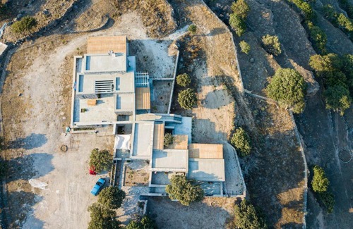 Nisyros Apartment | Pavlaina Complex of Traditional Residences in Nisyros. Enjoy the garden and the Sea View