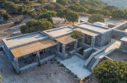 Nisyros Apartment | Pavlaina Complex of Traditional Residences in Nisyros. Enjoy the garden and the Sea View