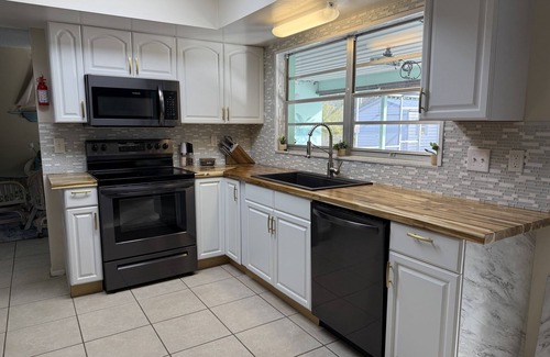 Port Charlotte House | Paws and poolside retreat: Cozy 2-bed, 2-bath, Salt Water Heated Pool