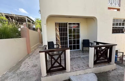 Charnocks Apartment | Peaceful 2-bedroom downstairs apartment walking distance to the airport.