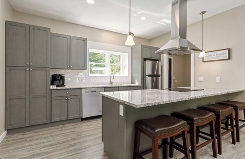 Cedar House | Peaceful 3-bedroom house 8 miles from TC with hot tub and fire pit!