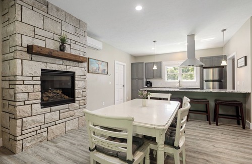 Cedar House | Peaceful 3-bedroom house 8 miles from TC with hot tub and fire pit!